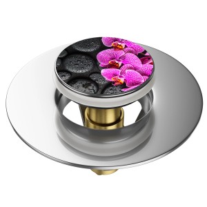 Sanilo Pop Up Waschbeckenstöpsel Madeira mit Orchideen-Motiv und Steinen.