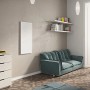 Weißes Ximax Aluminium Paneel mit Rahmen (600x1200 mm, 800 W) als Infrarotheizung an Wand im Wohnraum.