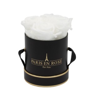 Rosenbox Schwarz-Gold mit 4 weißen Rosen, Durchmesser 10 cm. Dekorative, haltbare Blumen.
