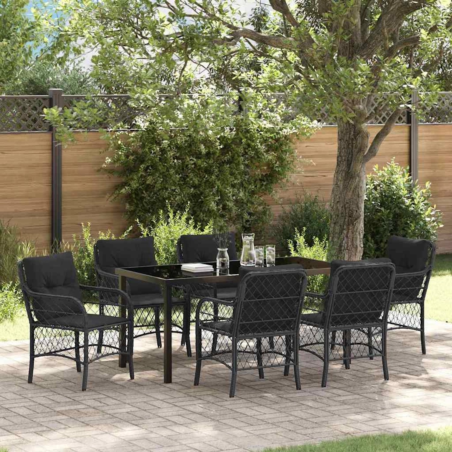 Schwarze 7-teilige vidaXL Garten Essgruppe aus Polyrattan mit Kissen.