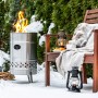 Feuerhand Pyron Feuertonne aus Edelstahl (25 l) im Garten mit brennendem Feuer.