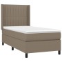 Taupes Boxspringbett 90x190 cm mit Matratze und Kopfteil. Bequemes Bett für erholsamen Schlaf.