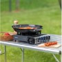 Campingaz Camp'Bistro 3 Tischkocher mit Pfanne und Zutaten auf Campingtisch.