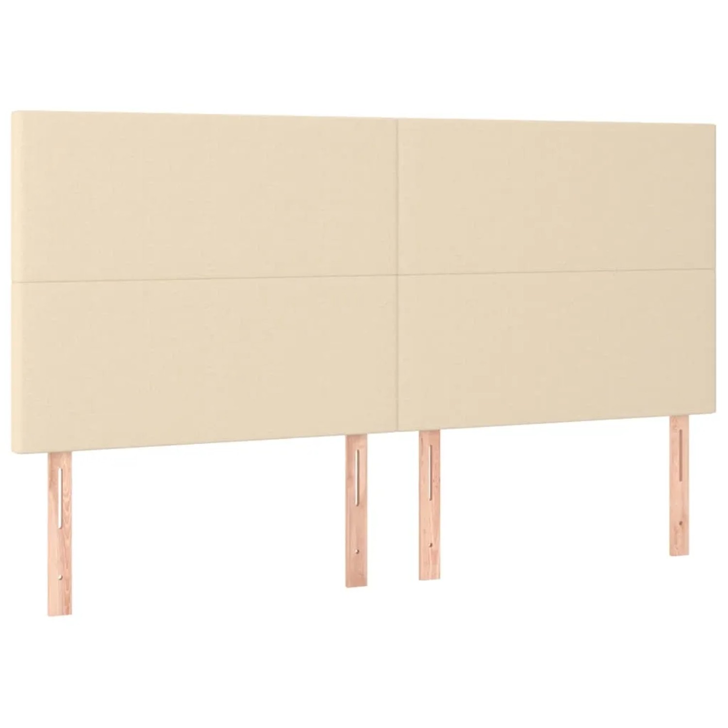 Cremefarbenes Boxspringbett mit Stoffbezug, inklusive Kopfteil und Holzfüßen.