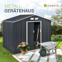 Juskys Metall Gerätehaus XL in Anthrazit mit Satteldach, Schiebetür, Schubkarre und Blume.
