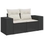 Schwarze 9-tlg. Garten-Sofagarnitur aus Poly Rattan mit cremeweißen Kissen.