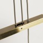 Detailaufnahme der braun-beigen Näve Pendelleuchte Tilde mit messingfarbenem Gestell.