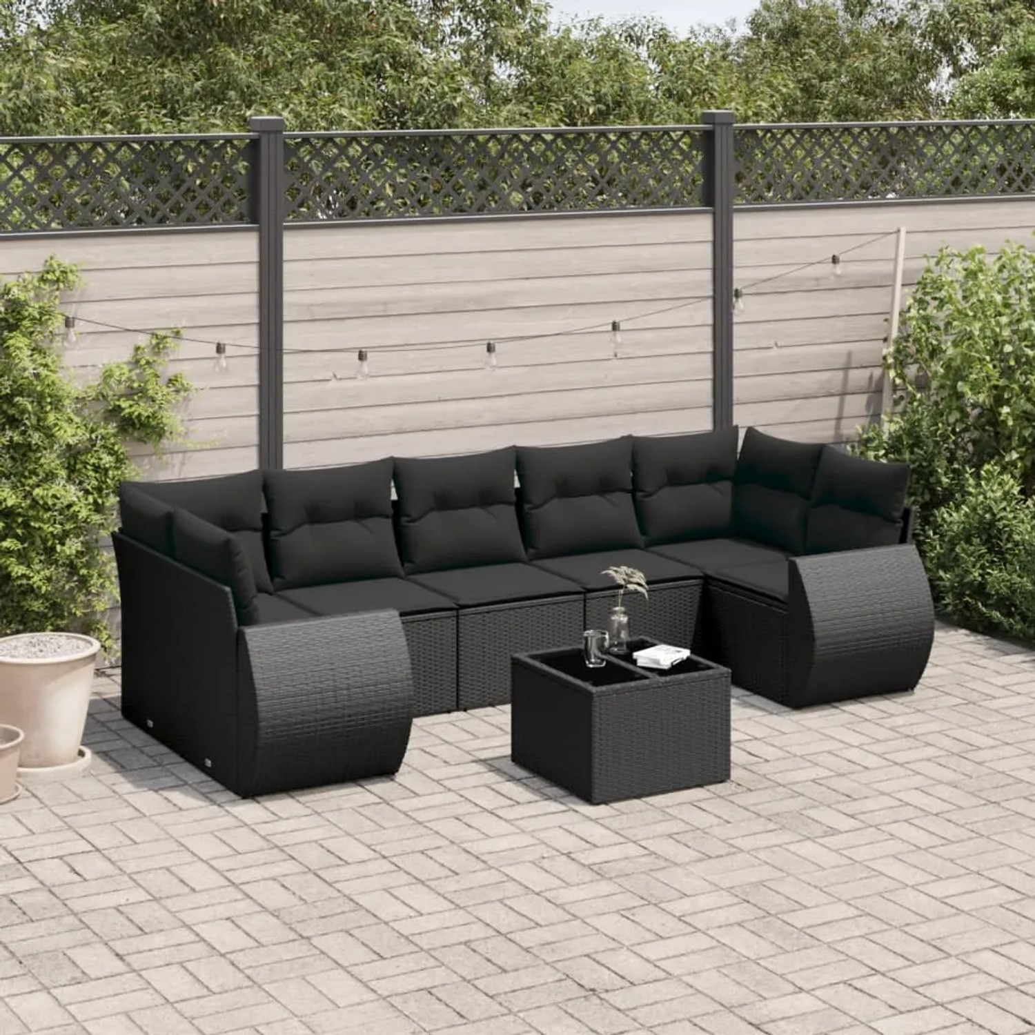 Schwarze 8-tlg. vidaXL Garten-Sofagarnitur aus Polyrattan mit Kissen und Tisch.