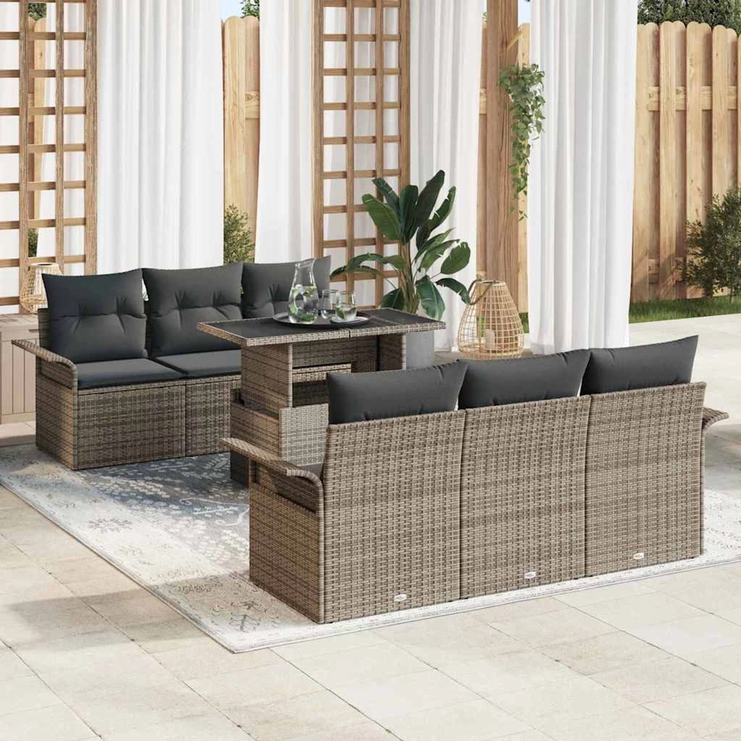 Graues 7-teiliges vidaXL Garten-Sofa-Set aus Poly Rattan mit Tisch und Kissen.
