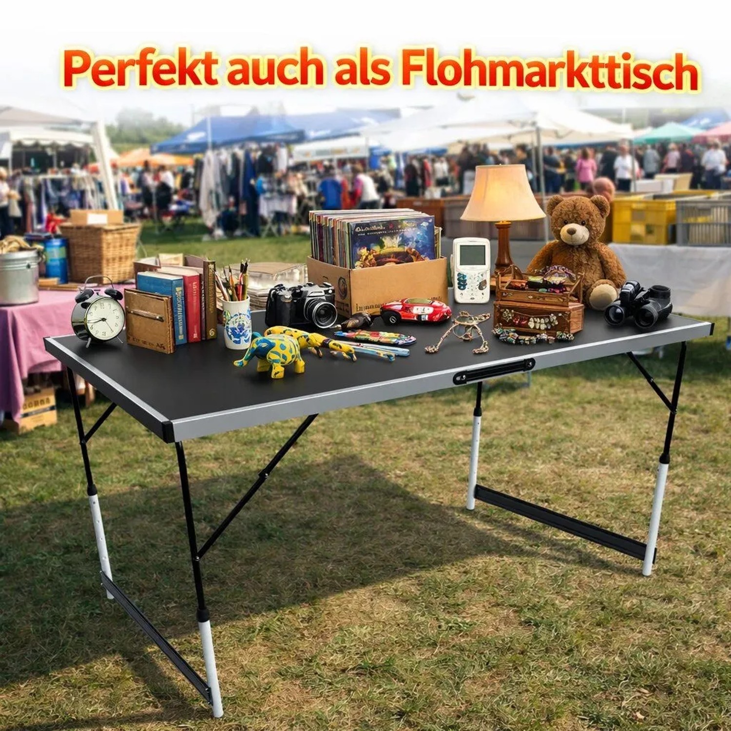 Höhenverstellbarer, klappbarer Campingtisch/Markttisch 100x60 cm mit Waren auf einer Wiese.