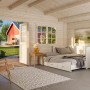 Innenansicht Palmako Gartenhaus Britta, grau-anthrazit lackiert, mit Möbeln eingerichtet.