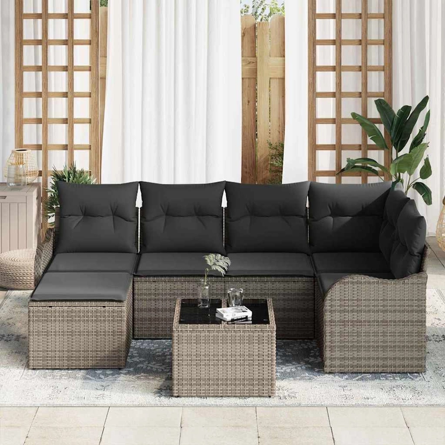 Graues 7-teiliges vidaXL Garten-Sofa-Set aus Rattan mit Kissen und Tisch.