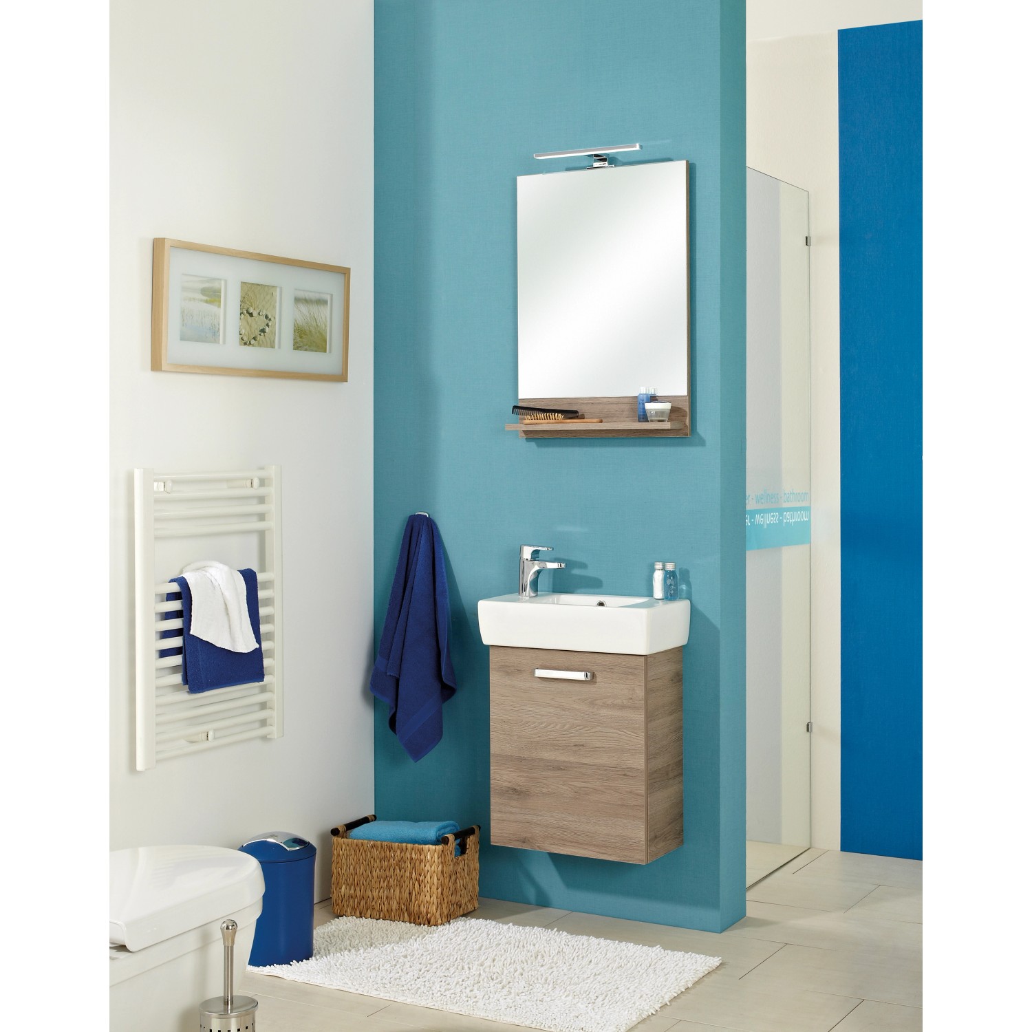 Pelipal Spiegel 50 cm Quickset 313 Sanremo Eiche mit Ablage im Badezimmer.