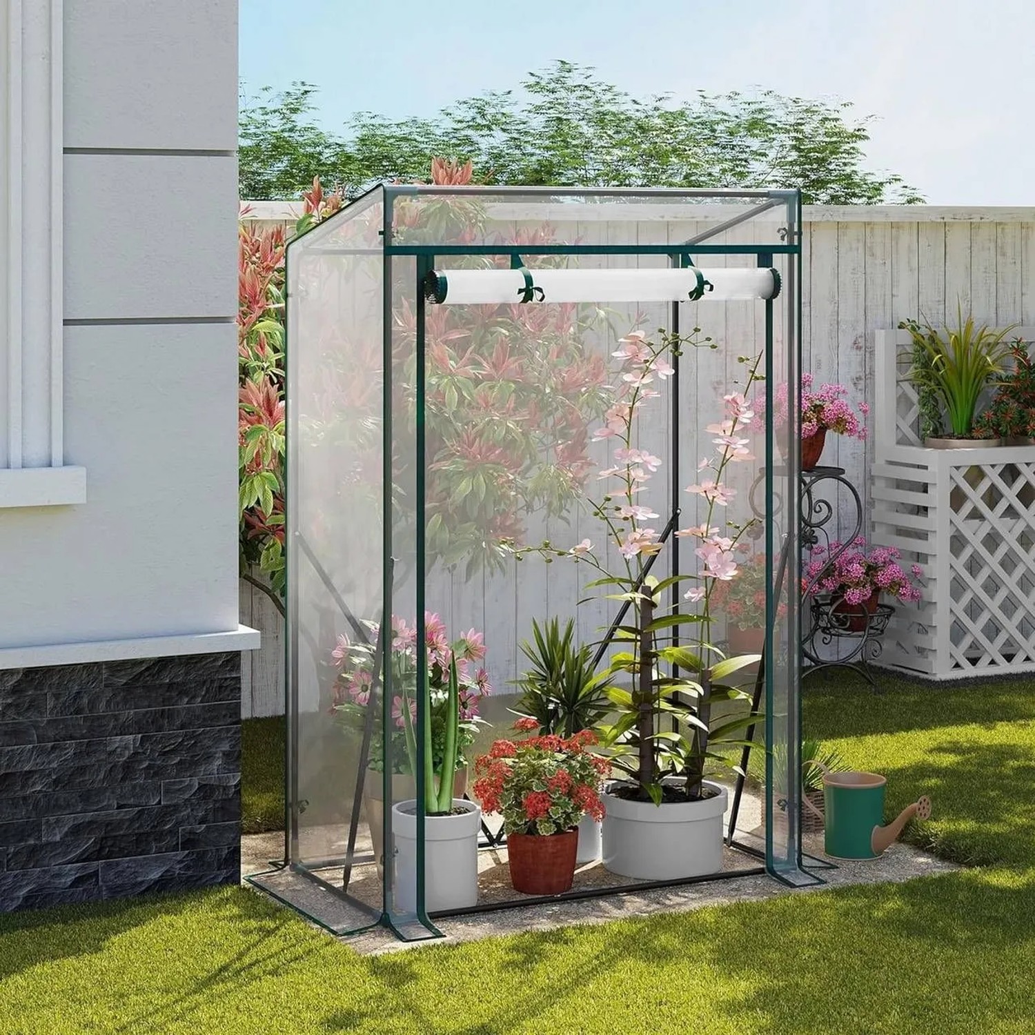 Transparentes WOLTU Foliengewächshaus 100x50x150cm mit Pflanzen im Garten.