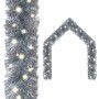 Silberne LED-Weihnachtsgirlande aus PVC mit warmweißen Lichtern, als gerades Stück und Bogen.
