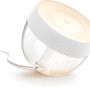 Philips Hue Iris Tischleuchte, weiße Lampe mit transparentem Fuß für farbige Akzente.