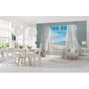 Komar Fototapete Malibu mit Strandmotiv in einem hellen Wohnraum.