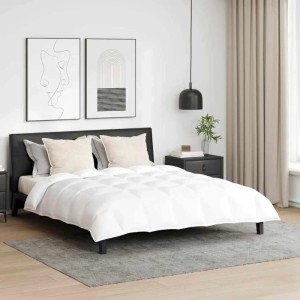 Weißes vidaXL Bettdecken Set mit gesteppter Daunenfeder-Bettdecke und Kissen auf modernem Bett.