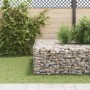 furnicato Würfel-Gabionen-Hochbeet, 60x60x60 cm, gefüllt mit Steinen im Garten.