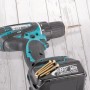 Akkuschrauber mit Fix-o-moll Magnetscheiben Neodym (Ø 19mm) und Schrauben auf Akku.