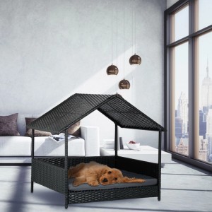 Anthrazitfarbene Relaxdays Hundeliege aus Polyrattan mit Dach und Kissen, ideal für den Garten.