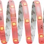 Aufgerolltes LED-Flexband RGB, 10 m, mit roten LEDs. Inkl. Fernbedienung zur Steuerung der Lichtfarbe.