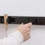 Wagner Hooks4tools Gerätehalter für Schlauch/Kabel an einer Wandhalterung.