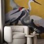 Komar Vliestapete Yellow Cranes: Gelbe Fototapete mit Kranich-Motiv im Wohnraum.