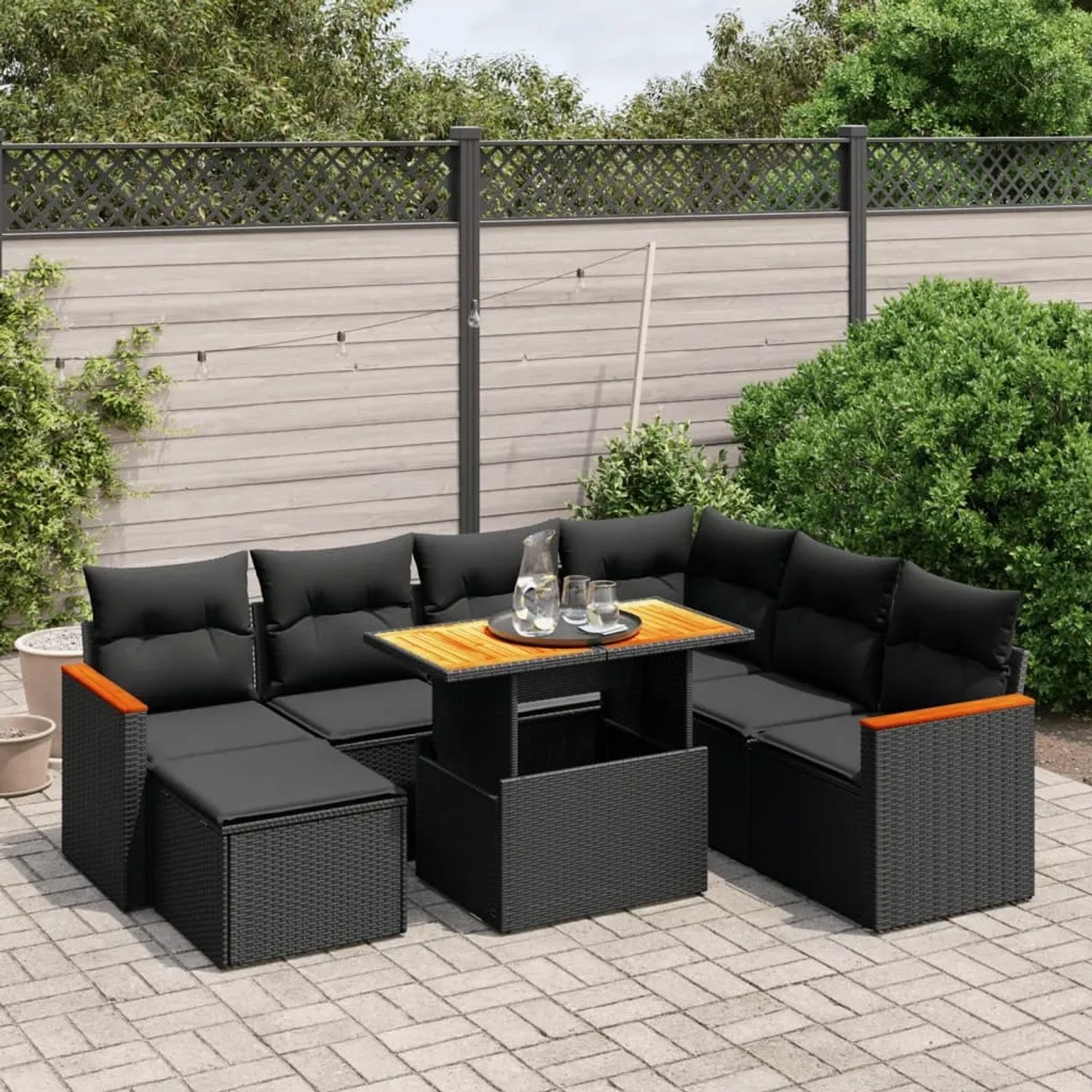 Schwarze 8-tlg. vidaXL Garten-Sofagarnitur mit Kissen und höhenverstellbarem Tisch.