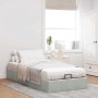 Hellgraues Samt-Ottoman-Bett 100x200 cm mit Stauraum und Hebemechanismus in einem Schlafzimmer.