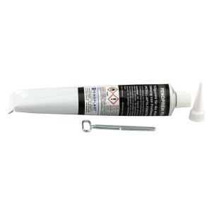 Schwarze Tube Fenoplast Fenopren Fd Kleb-Dichtgummi 180g mit weißer Kappe und Metallschlüssel.