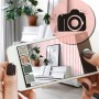 Smartphone zeigt ESTAhome Vliestapete Streifenmuster Rosa und Weiß per AR an einer Wand. Dekorative Tapeten.