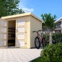 Unbehandeltes Weka Holz-Gartenhaus Pesaro mit Flachdach und Fahrrad davor.