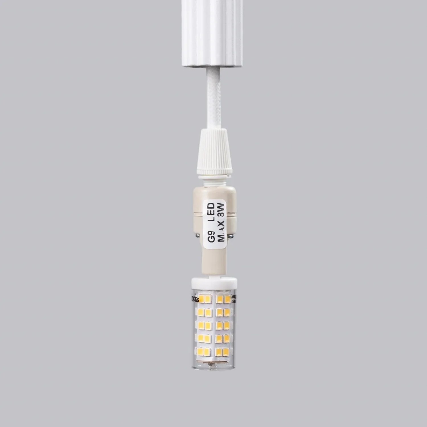 Detailaufnahme der weißen Sollux Arche Pendelleuchte mit G9 LED Leuchtmittel (max. 8W).