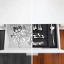 Ausziehbarer Relaxdays Besteckkasten aus Bambus und MDF, schwarz, mit Besteck in Schublade.
