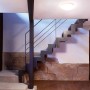 Steinel LED Deckenleuchte RS 16 S mit Bewegungsmelder an Treppenhauswand.