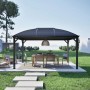 Anthrazitfarbener Sojag Aluminium Pavillon Moreno 10x14 mit Tisch und Stühlen im Garten.