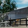 Hepa Solar Balkonkraftwerk Basic mit schwarzem Rahmen, montiert am Balkongeländer.