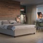Schlafzimmer mit Egger DecoWall Wandpaneel Namur Fichte Natur als Wandverkleidung hinter dem Bett.