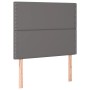 Graues vidaXL Boxspringbett Kopfteil mit Kunstlederbezug und Ziernägeln.