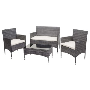 4-teilige Poly-Rattan Lounge-Garnitur in Grau mit creme-farbenen Kissen und Tisch mit Glasplatte.