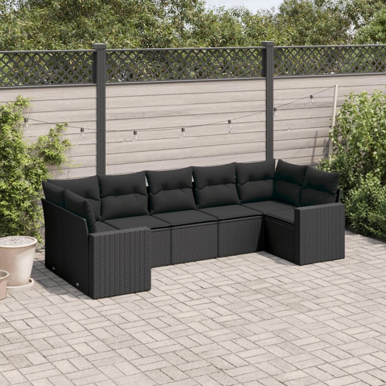 Schwarze 7-tlg. vidaXL Garten-Sofagarnitur aus Poly Rattan mit Kissen für Terrasse und Garten.