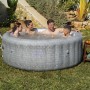 Bestway Bali AirJet aufblasbarer Whirlpool in Rattan-Optik mit 4 Personen im Garten. Entspannung für 6.