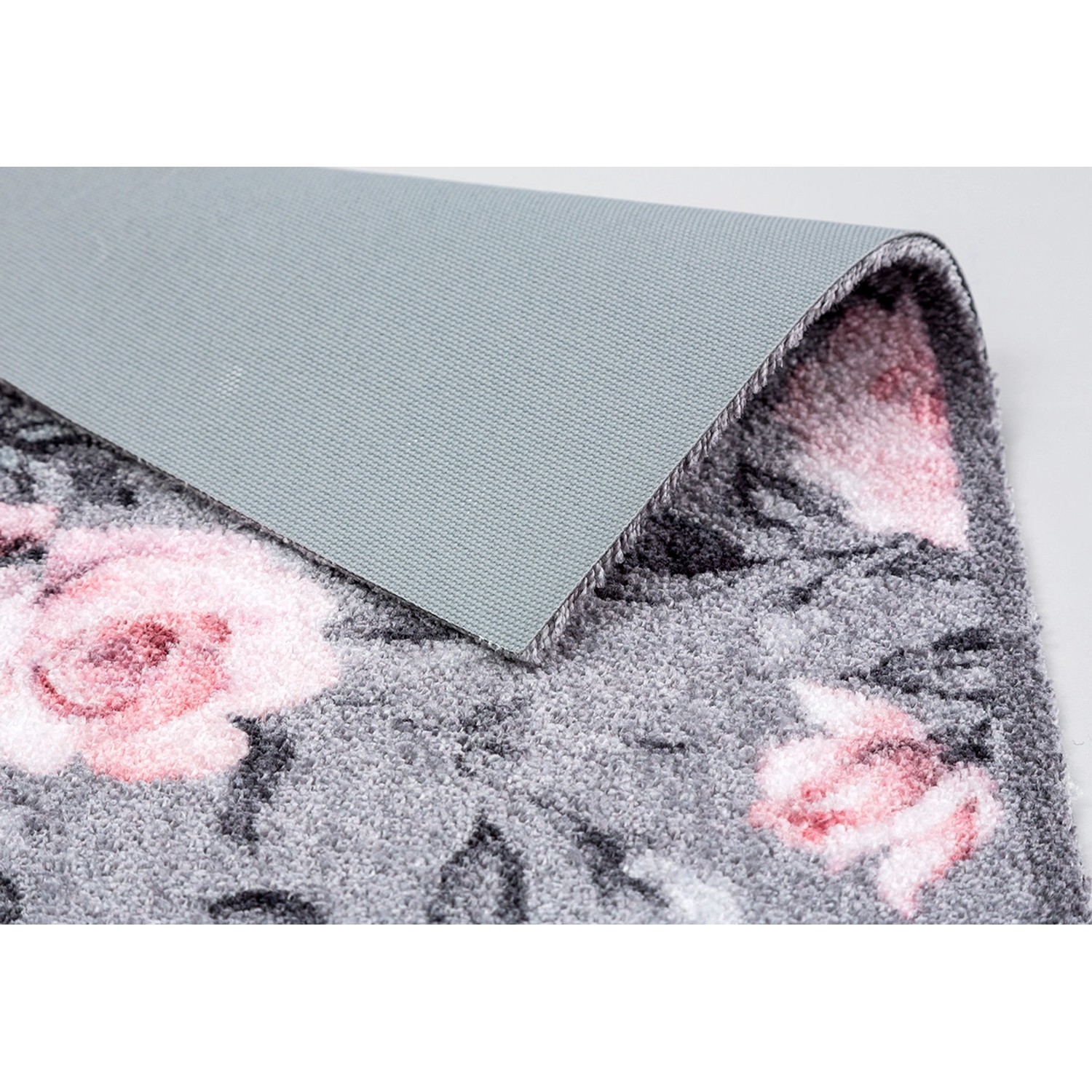 Grau-rosa Astra Sauberlaufmatte (50x70 cm) mit Blumenmuster und rutschfester Rückseite.