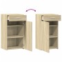 Sideboard Sonoma-Eiche aus Holzwerkstoff mit Schublade und Schranktür, die beidseitig montierbar ist.