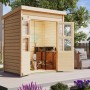 Karibu Gartenhaus Neuenburg 0, vorvergraut, mit Pultdach und geöffneten Doppeltüren.