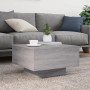 Moderner, grauer Couchtisch mit LED-Beleuchtung, 55x55 cm, passend zum Sofa.