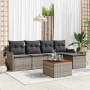 Graues 6-teiliges vidaXL Garten-Sofa-Set aus Poly Rattan mit Tisch und grauen Kissen.
