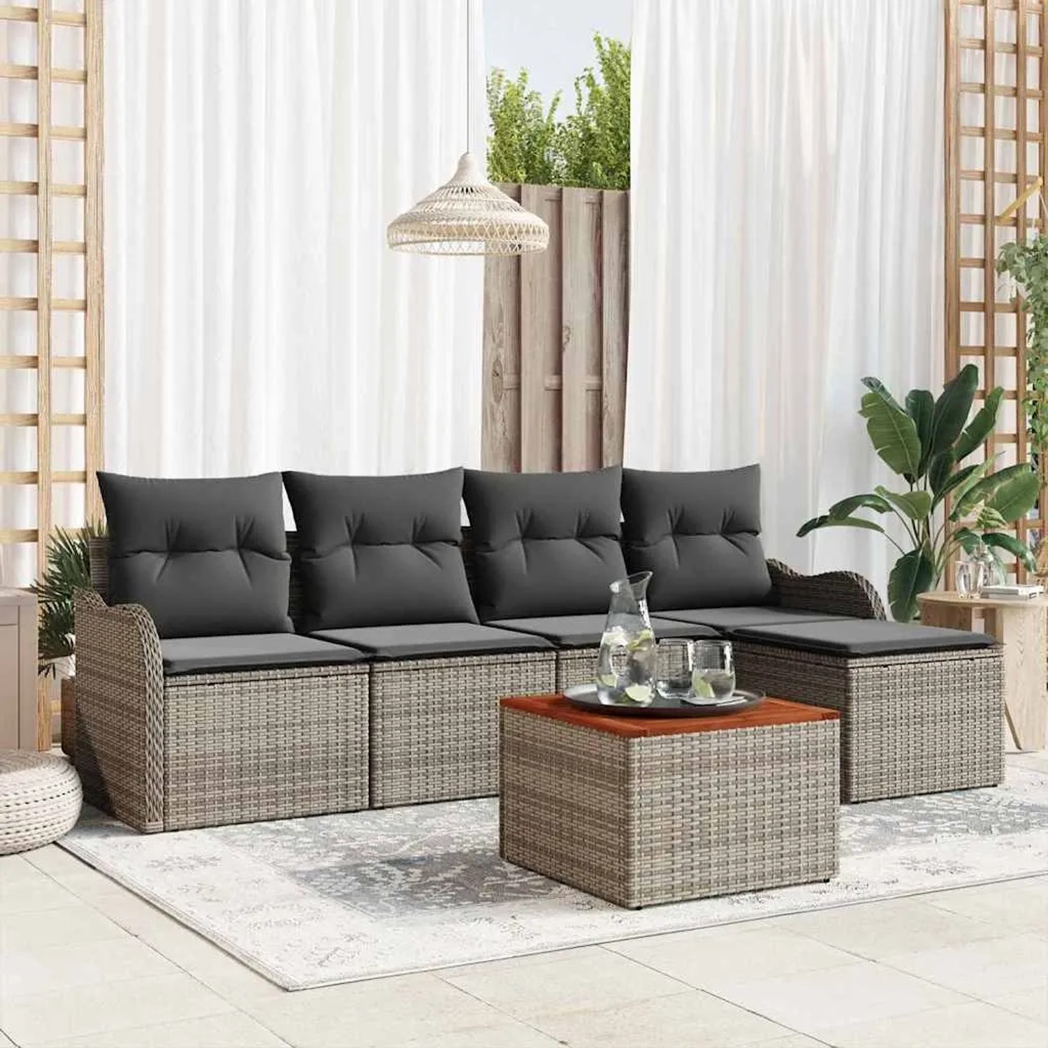 Graues 6-teiliges vidaXL Garten-Sofa-Set aus Poly Rattan mit Tisch und grauen Kissen.