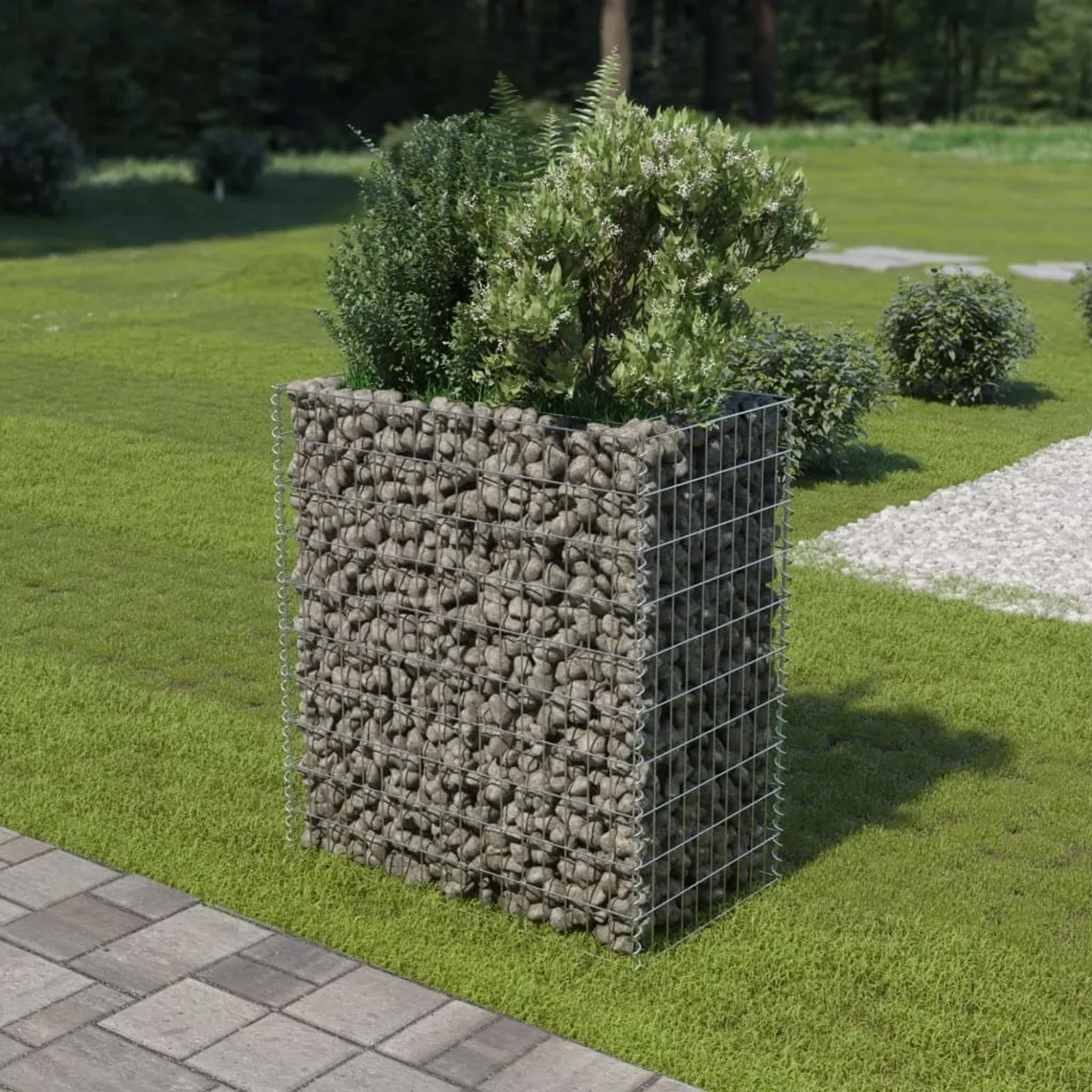 VidaXL Gabionen-Hochbeet aus Stahl, gefüllt mit Steinen, im Garten.